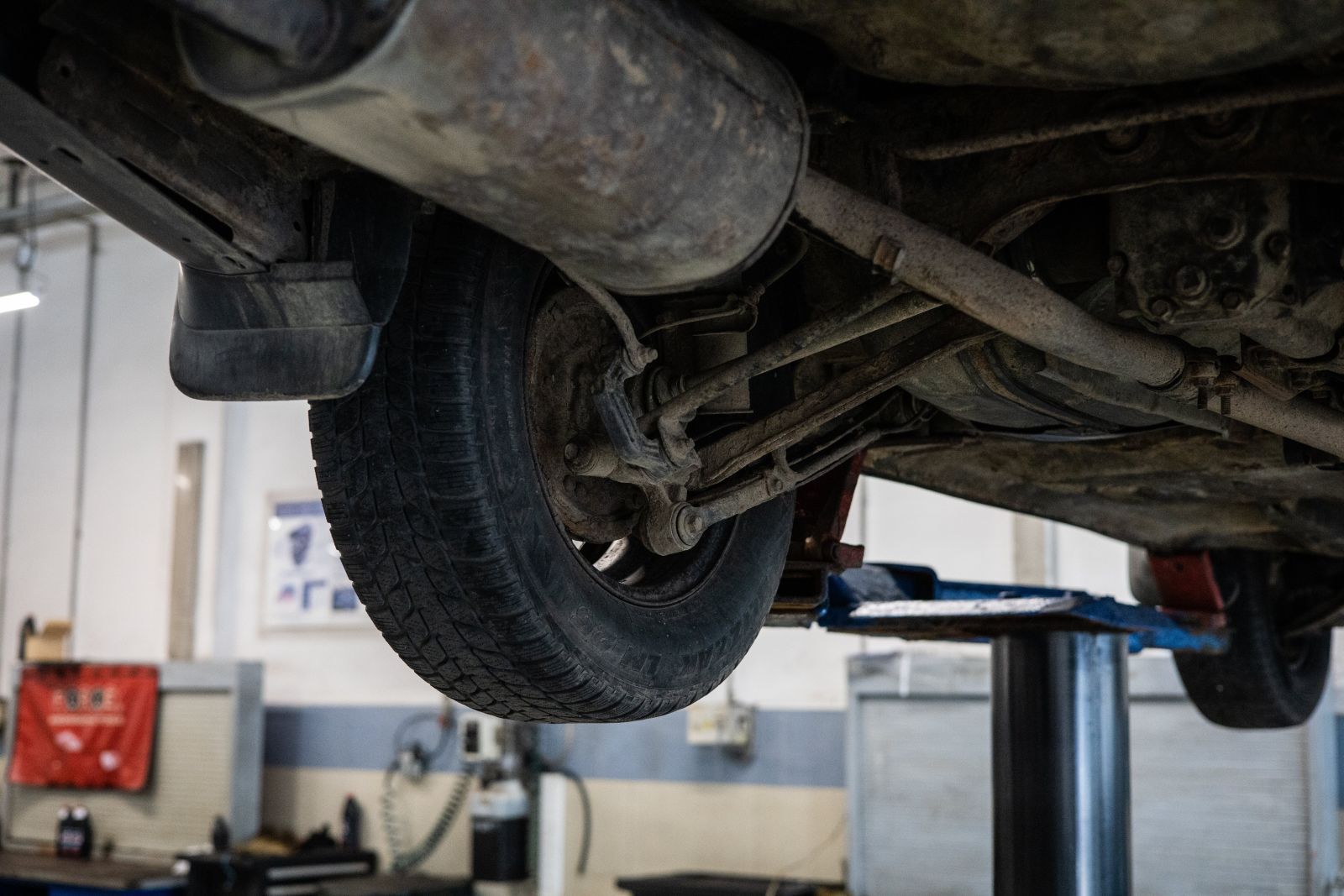 An old car facing common exhaust system issues.